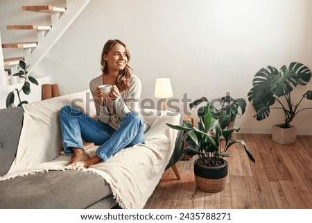 Similar – Image, Stock Photo Relaxed woman sitting on beach with surfboard on head