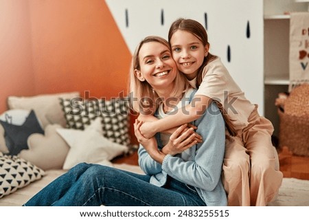 Similar – Image, Stock Photo Child hugging mother Love