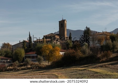 Autumnal skyline of the small town of Bailo, with its tower of the church de San Fructuoso, in the region of La Jacetania, province of Huesca, Aragon, Spain Stok fotoğraf © 