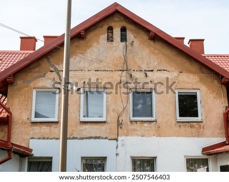 Similar – Foto Bild Schäbige Fassade eines Wohnhauses in der Stadt