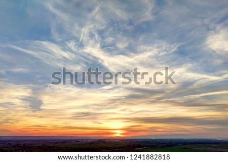Similar – Image, Stock Photo Fair weather clouds in front of a blue sky and a small section of a red tiled roof with a parabolic antenna / satellite dish / football transmission