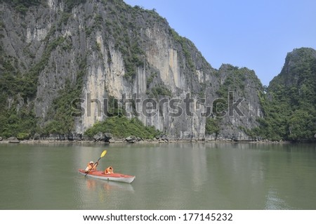 HA LONG BAY, VIETNAM - MAY 25: Unidentified tourist kayaking at Ha Long bay, Vietnam on May 25, 2011