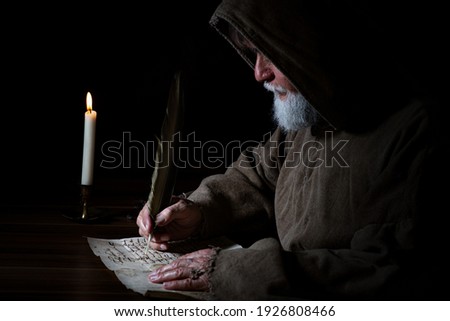 Medieval monk writes a letter Сток-фото © 