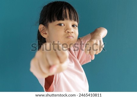 Similar – Image, Stock Photo Little girl, eight years old, sitting on the grass outdoors.