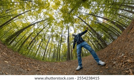 Similar – Foto Bild einsamer kahler Baum auf einer Wiese vor blauem Himmel mit Wolken