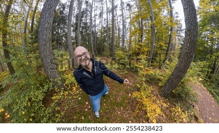 Similar – Foto Bild einsamer kahler Baum auf einer Wiese vor blauem Himmel mit Wolken