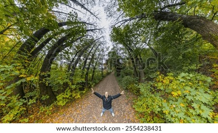 Similar – Foto Bild einsamer kahler Baum auf einer Wiese vor blauem Himmel mit Wolken