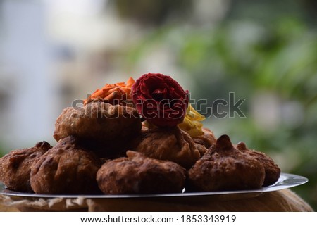 Modak or sweet fried mo-mos ,it is a traditional and popular Indian sweet dish made during the Ganpati festival in India Stock fotó © 