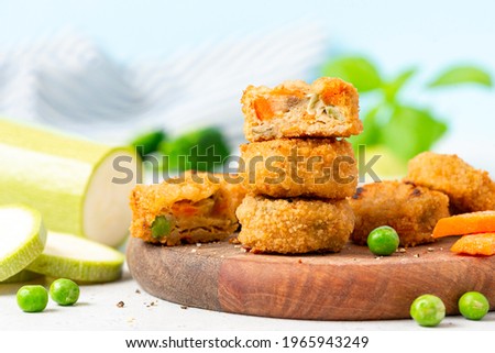 Similar – Image, Stock Photo Fresh cooked food in baking dish with various ingredients. Kitchen equipment. Dark concrete background.Flat lay. Top view