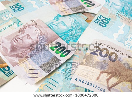 Real currency ( BRL ), money from Brazil. Dinheiro, Reais, Real Brasileiro, Brasil. A group of brazilian banknotes in close up.