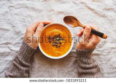 Similar – Image, Stock Photo Male hand holding squashed plastic bottle