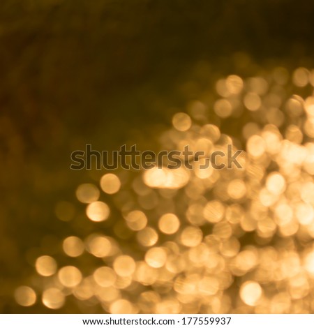 golden and yellow circle background, bokeh, decorative defocused lights, blurred sparkles