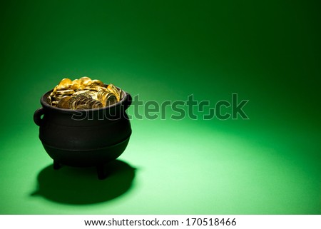Pot Of Gold: Treasure on Green Background.