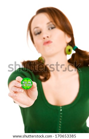 Green: Holding Irish Kiss Me Pin and Making Kiss Face
