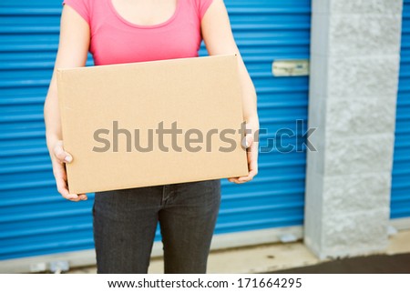 Storage: Anonymous Woman With Packing Box