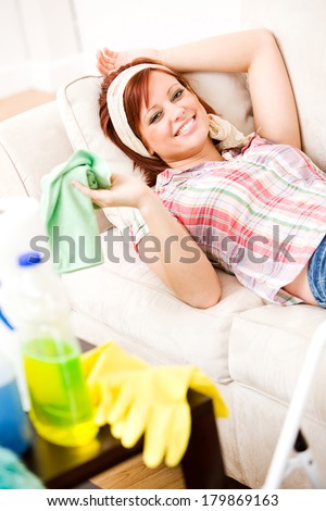 Cleaning: Woman Taking A Break From Cleaning