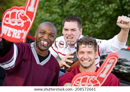 Tailgating: Guy Friends Cheering Their Team On To Victory