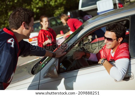 Tailgate: Guy Arrives To Tailgate Party In Car