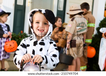 Halloween: Smiling Boy In Halloween Dalmatian Costume Trick Or Treating