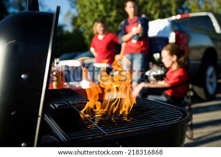 Tailgate: Charcoal Burning In Grill During Tailgating Party