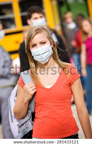 School Bus: Wearing a Mask to Avoid Flu