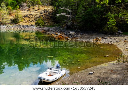 Similar – Image, Stock Photo On the shore of a lake the angler waits for his catch