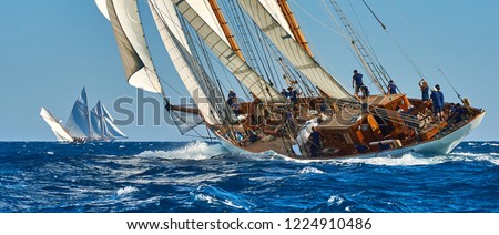 Similar – Image, Stock Photo Sailboat on sea under blue sky in daytime
