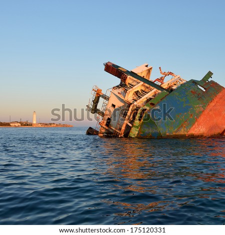 Sunken ship at sunset