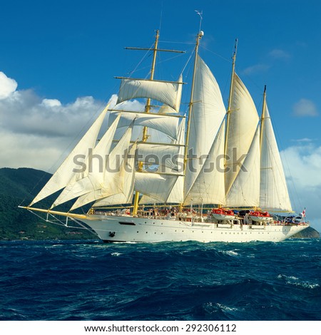 Sailing ship with beautiful cloudless sky. Sailing. Luxury yacht.