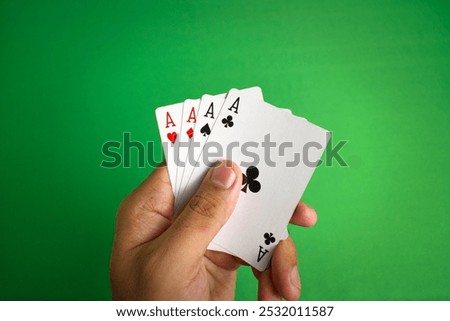 Image, Stock Photo Hand holding a four pack beer presentation with yellow background