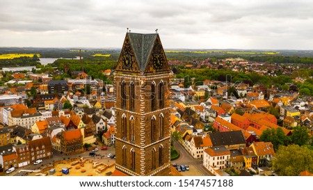 Similar – Image, Stock Photo Marienkirche in Wismar in the sunset.