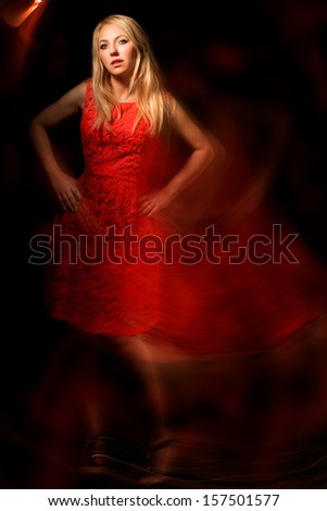 Woman in red dress - fashion with mixed light
