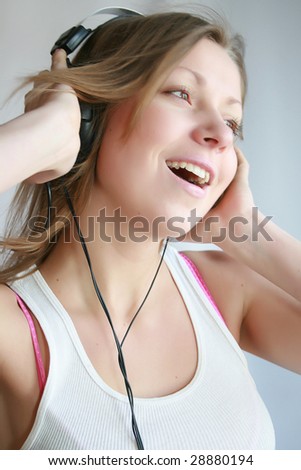 woman listening music and dances