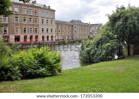 Beautiful resting spot on river Sarthe of Alencon, Normandy France - Beautiful river relaxing scene in French town