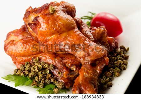 Braised duck wings, Chinese cuisine.