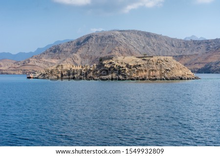 Similar – Image, Stock Photo Rocky formations near still lake