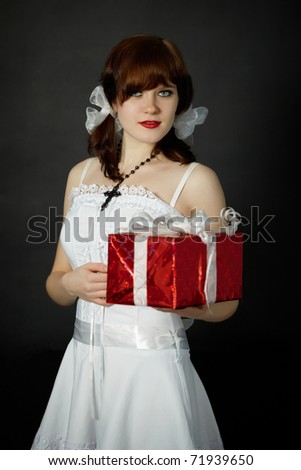 Young woman gives gift