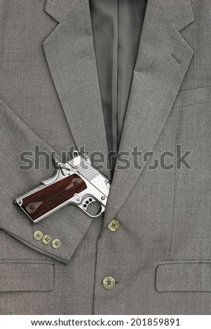 Semi-automatic handgun in business suits, 45 pistol.
