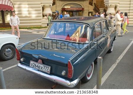 MOSCOW, RUSSIA - July 26, 2014:  Soviet car Moskvich-408 on retro rally Gorkyclassic in the Parking lot near Gum Department store, Moscow, rear view