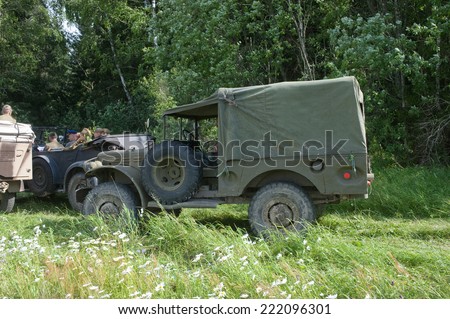 CHERNOGOLOVKA,MOSCOW REGION, RUSSIA-JUNE 21,2013:American military retro car Dodge WC-51 on retro rally on a forest road,3rd international meeting \