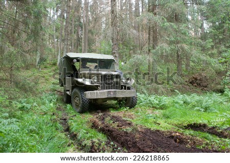 CHERNOGOLOVKA, MOSCOW REGION, RUSSIA-JUNE 21, 2013: American military Dodge WC-51 rides on the hard road, 3rd international meeting \