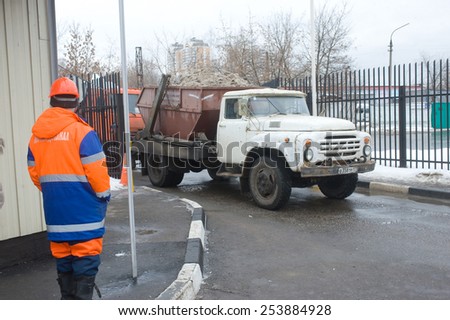 MOSCOW, RUSSIA - February 13, 2015: The old white truck ZIL with snow enters into a snow melting point in Moscow
