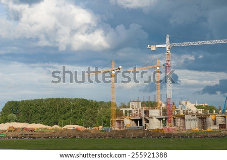 MOSCOW, RUSSIA - June 29, 2012: Tushino airfield, views of the cranes on the construction of the stadium \