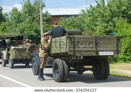 CHERNOGOLOVKA, MOSCOW REGION, RUSSIA - JUNE 21,2013:Old truck in a convoy of military retro cars on the road, the 3rd international meeting of \