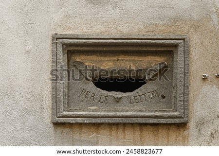 Similar – Image, Stock Photo old, pasted mailbox slot with a flap that says “LETTERS”, made of metal in an old wooden door, where the brown paint is peeling off / write letter / e-mail / mailbox company