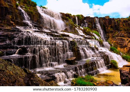 Pongour Waterfall - a magnificent destination to admire the splendor of nature. (Da Lat, Lam Dong Province, Vietnam). Foto d'archivio © 