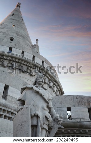 Budapest, Hungary- 27 June, 2014 : Fisherman\'s Bastion (Halaszbastya) fortification under pink sunset sky with Knight sculptures in Budapest, Hungary.
