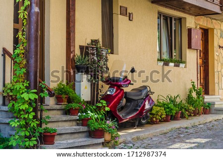 Similar – Image, Stock Photo Passage between small town houses in summer