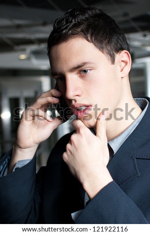 Business man talking on the phone worry