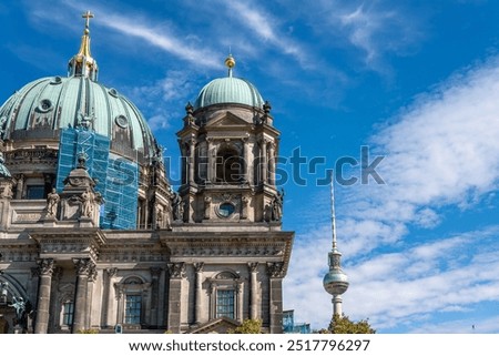 Similar – Image, Stock Photo The TV tower in Berlin is reflected in the panes of glass on the facade of the new building.